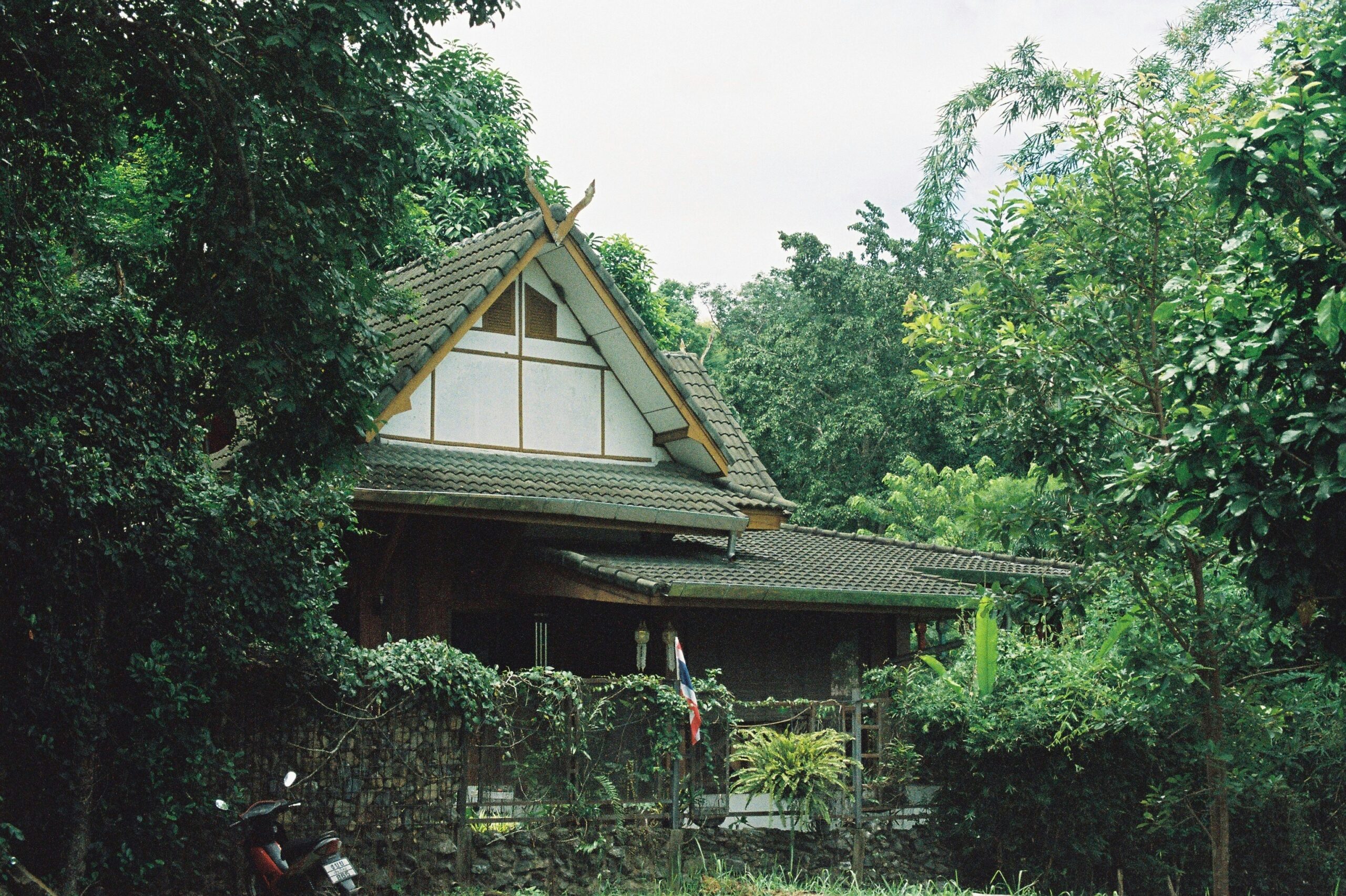 Traditional residential house surrounded by greenery, highlighting how overlooking location and condition can become a property valuation mistake.